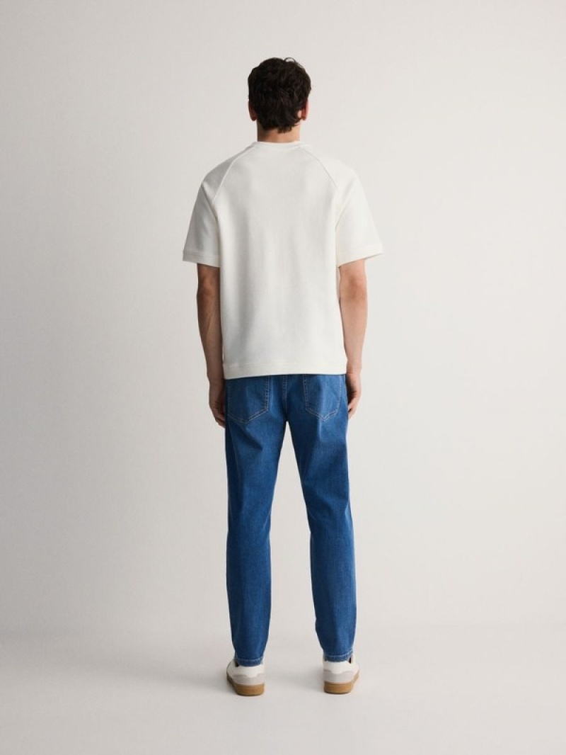 Blue Men's Reserved Carrot Slim Jeans | 94127NKWY