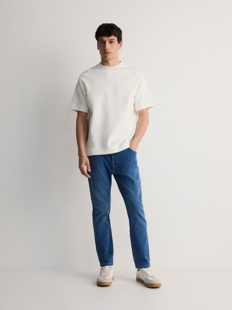 Blue Men's Reserved Carrot Slim Jeans | 94127NKWY